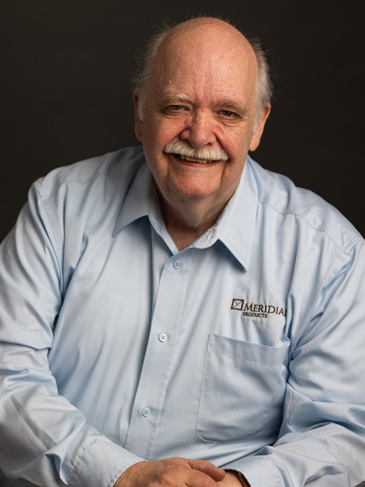 A headshot of Greg Miller